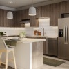 kitchen with island and bar stools