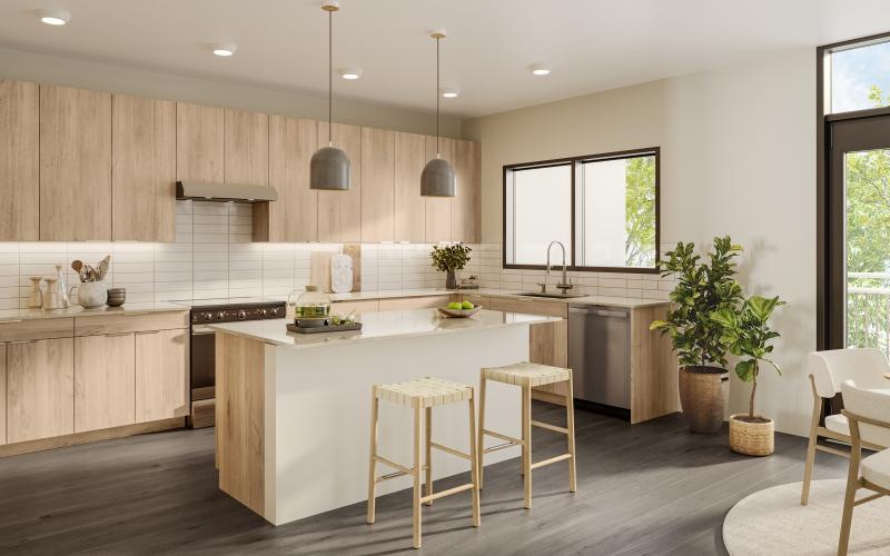 a kitchen with a bar stool and a table