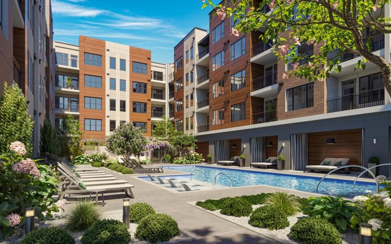 a swimming pool in a courtyard between buildings