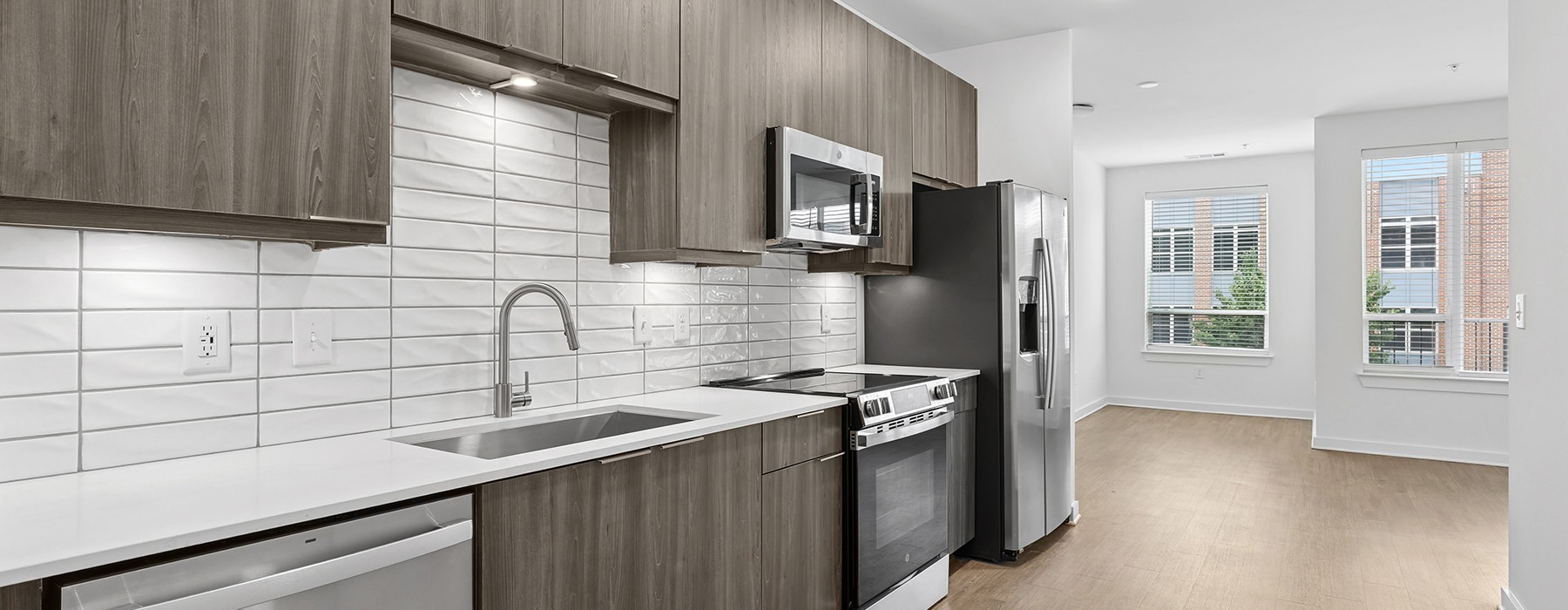 kitchen with wood cabinets and wood floors