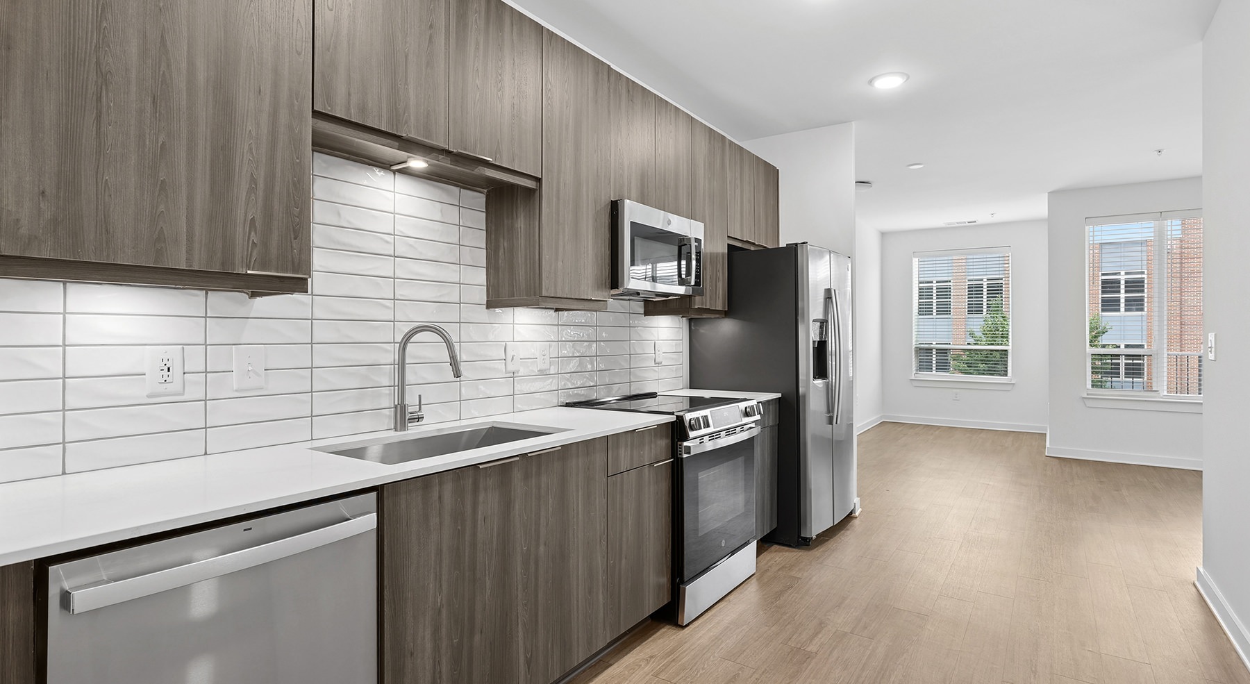 kitchen with wood cabinets and wood floors